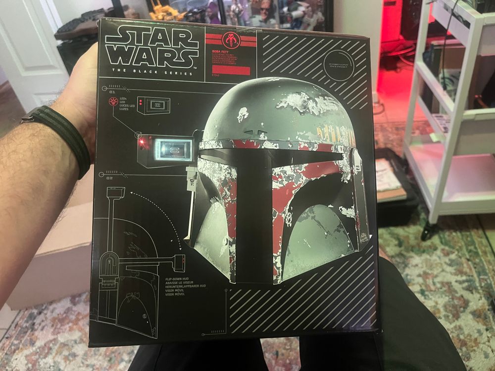 A big box with a picture of Boba Fetts helmet