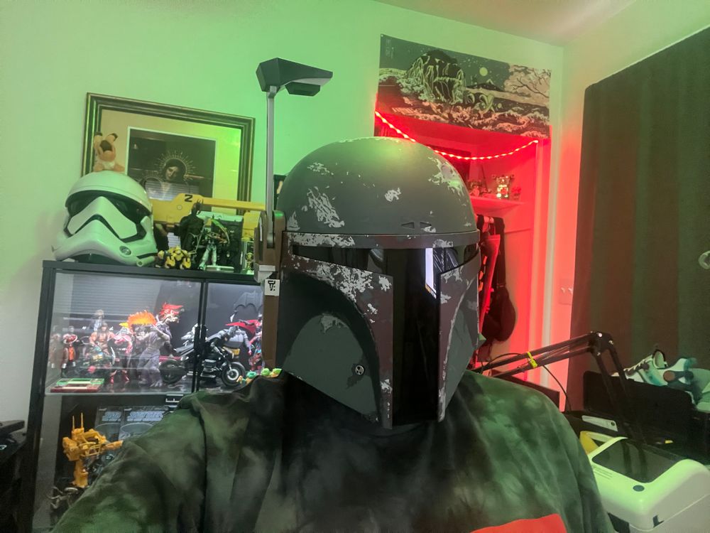 Ben wearing his new Mandalorian helmet