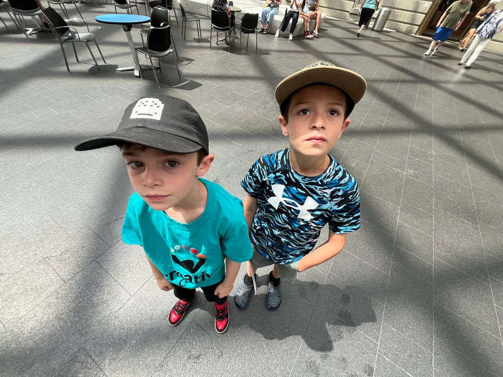 Two young gentlemen standing in the courtyard of the national portrait gallery