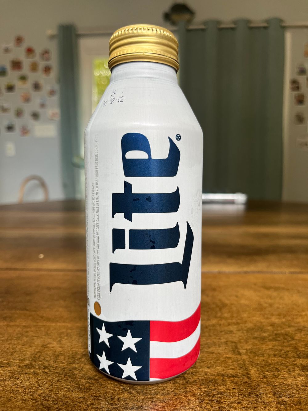 An aluminum can of Miller Lite with some flag iconography on it