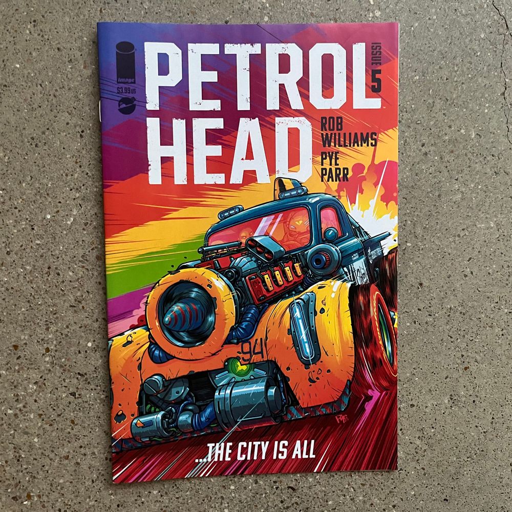 A comic book with a heavily modified junk racing car in vibrant colors