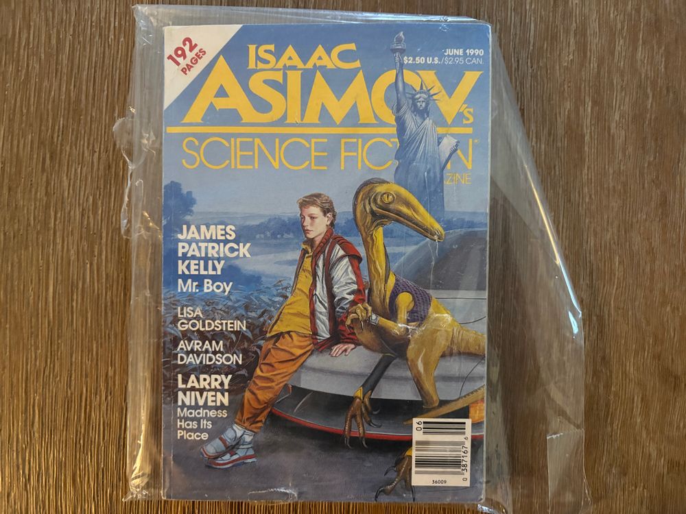 A copy of Isaac Asimov's Science Fiction magazine showing a teenage boy and a yellow-skinned dinosaur leaning on a futuristic sports car. What looks like a version of the statue of liberty is in the background.